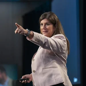 Speaker pointing finger at audiente in a conference in Barcelona, Spain.